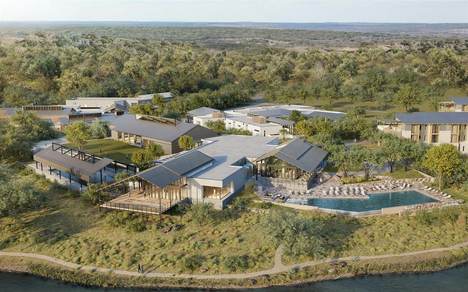 Rendering of the Canyon Ranch Austin resort buildings with standing-seam metal roofs beside the water